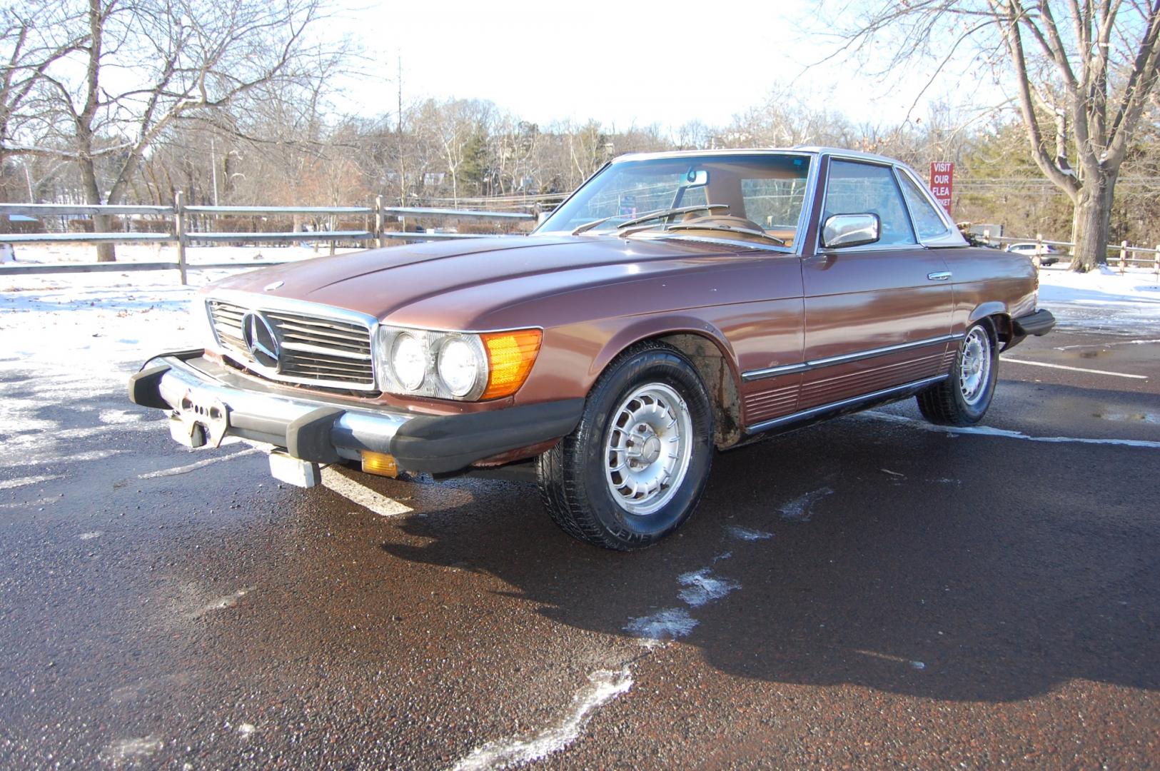 1976 Brown /Brown Leather Mercedes-Benz 450SL (10704412030) with an 4.5L V8 engine, Automatic transmission, located at 6528 Lower York Road, New Hope, PA, 18938, (215) 862-9555, 40.358707, -74.977882 - Here we have a nice 1976 Mercedes 450SL convertible with a 4.5L V8 engine putting power to the rear wheels via an automatic transmission. Some options on this vehicle include brown leather, wood trim, power windows, removable hard top, heat, A/C, AM/FM radio, cruise control, wood steering wheel, 14 - Photo#2